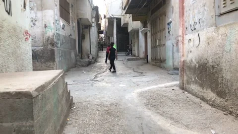 Palestinian children playing Stock Footage 156358480