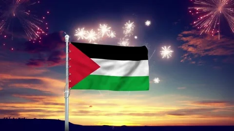 Palestinian flag waves proudly with fireworks in the motion footage clip Stock Footage 342369611