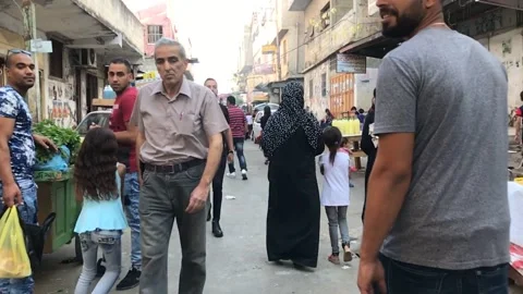 Palestinian refugee camp market Stock Footage