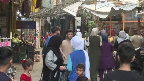 Palestinian refugee camp, target for first Israeli strike in northern Lebanon, T Stock Footage 287562888