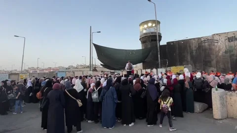 Palestinian women queue for last Friday prayers during Ramadan, PALESTINE, PS -  Video stock 204124686