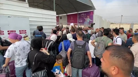 Palestinians Holding Foreign Passports Queue At Gaza Crossing Stock Footage 255301207