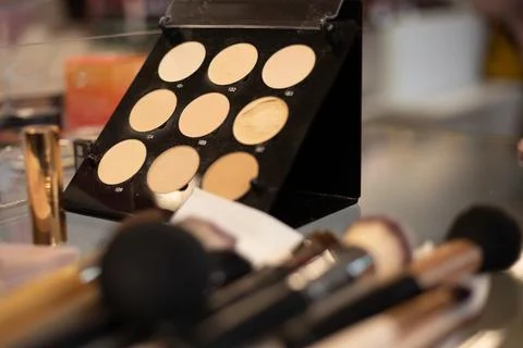 Palette of basic beige-brown shades for eye makeup and facial contours, various Stock Photos