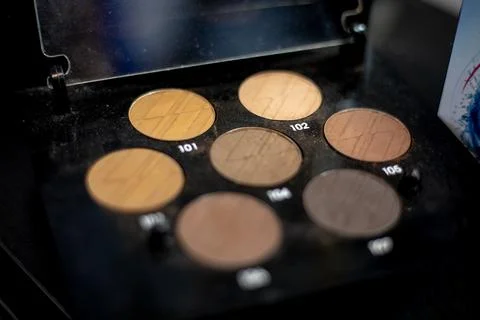 Palette of basic beige-brown shades for eye makeup and facial contours 스톡 사진