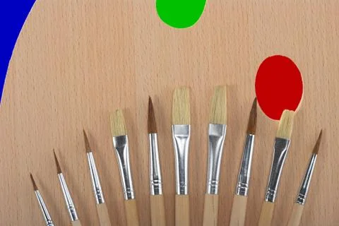 Palette with brushes Stock Photos