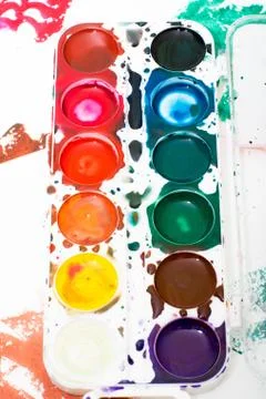Palette of children's watercolor paint Stock Photos