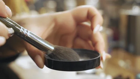 A palette with eye shadows and a makeup brush: women's cosmetics. Morning make Stock Footage 101021550