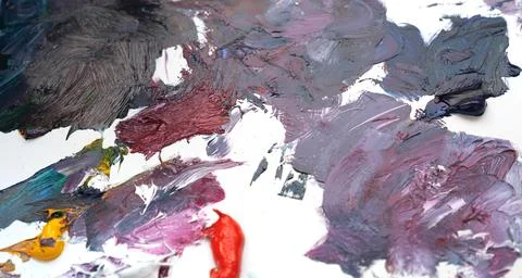 A palette with multi-colored paint Fotos de archivo