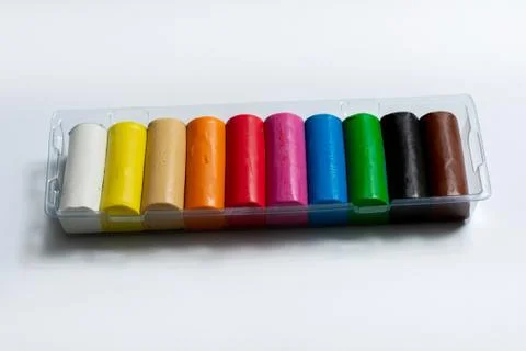Palette of multi-colored plasticine bars on a white background. Foto stock