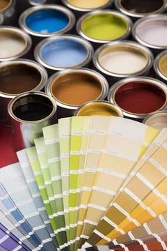 Palette of paint samples and paintbrush Stock Photos