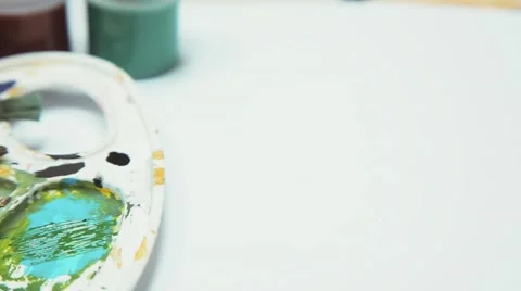 Palette with paints and paint brushes Stock Footage 59337957