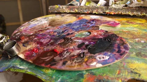 A palette with paints in an art workshop Stock Footage 68056569