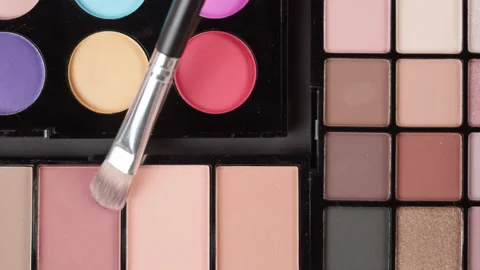 Palette of shadows close-up. Trying cosmetic texture. Makeup and beauty products Stock Footage 166320230