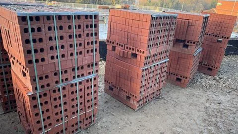 Pallet Stacks of Red Clay Bricks on Construction Site 写真素材