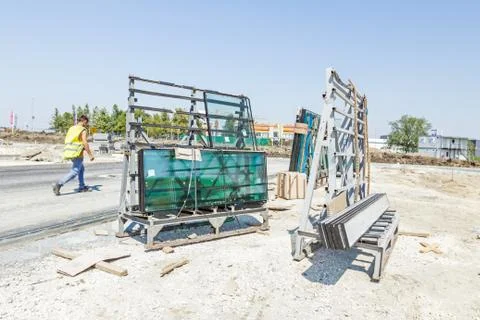 Pallet with thermo window glasses in construction site, Stock Photos