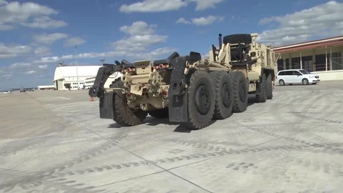Palletized Load System vehicle arrives at a military base Stock Footage 111849171