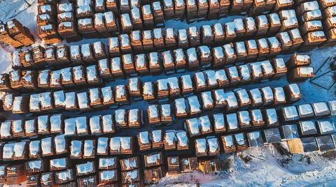 Pallets of bricks for construction. Outdoor storage in winter Stock Photos