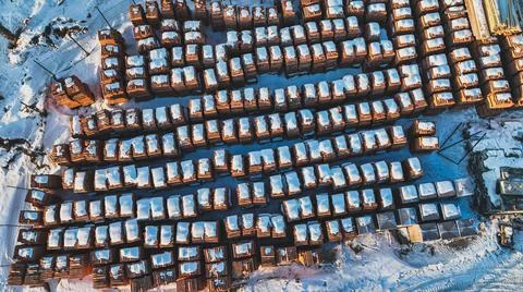 Pallets of bricks for construction. Outdoor storage in winter Stock Photos