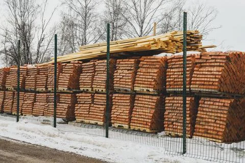 Pallets of bricks for construction. Outdoor storage in winter Stock Photos