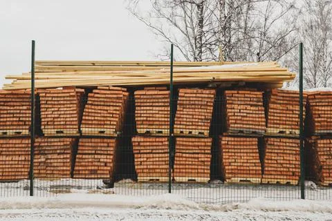 Pallets of bricks for construction. Outdoor storage in winter Stock Photos