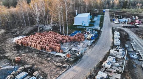 Pallets of bricks for construction. Outdoor storage Stock Photos