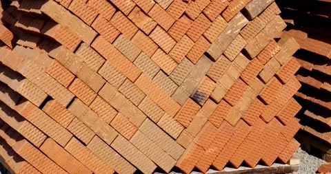 Pallets with red bricks stand on top of each other, stock of building bricks 動画素材 131004056