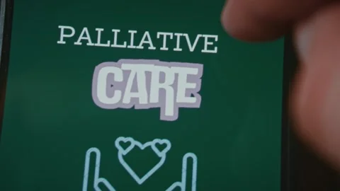 Palliative Care themed graphic presentation examined on smartphone Stock Footage 289085027