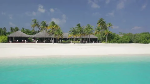 Palm beach with restaurant Stock Footage 1007926
