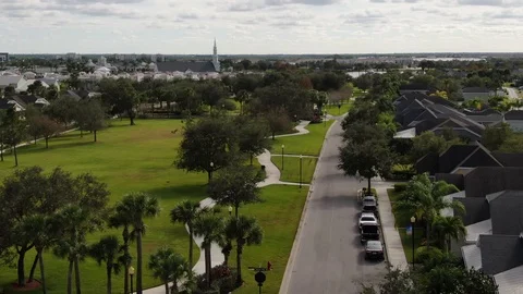 Palm-lined park and homes at Tradition, Port St. Lucie Stock-Footage 100281992