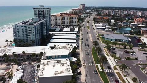 Palm-Lined Street and Oceanfront Residences at Indian Shores 스톡 동영상 336701214