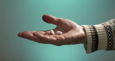 Palm with medical tablets Stock Footage 314499513