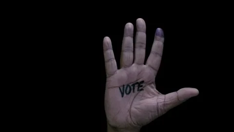Palm Open and word Vote written on it Stock Footage 248780819