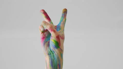Palm painted in different colors of rainbow on white background, isolated Stock Footage 160918291