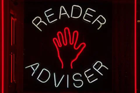 Palm reader adviser neon 写真素材