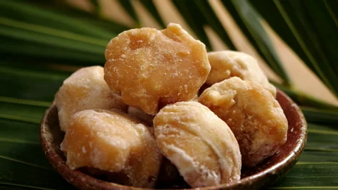 Palm sugar drop in slow motion Stock Footage 142120994