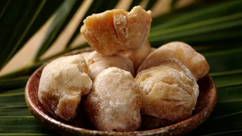 Palm sugar drop in slow motion Stock Footage 142914919