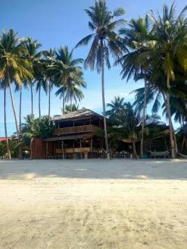 Palm tree hut Stock Photos