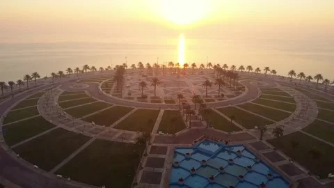 Palm Tree Roundabout at Al Khobar Corniche Sunrise Stock Footage 335309750