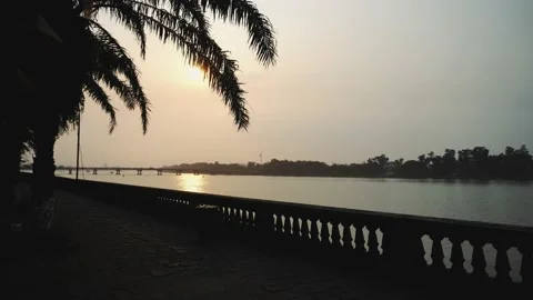 Palm tree at sunset and river Vietnam Asia Stock Footage 132162718
