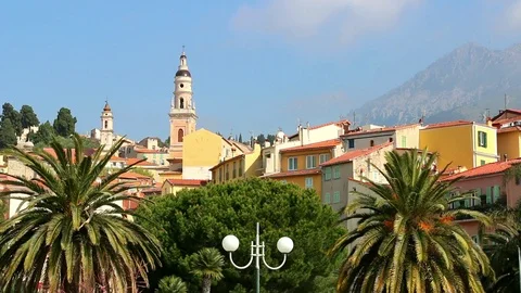 Palm trees and Bell Tower. Menton . France Stock Footage 109149876