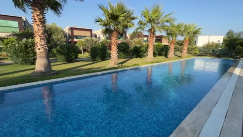 Palm Trees And Swimming Pool Bodrum Turkey Stock Footage 219346481