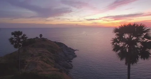 Palm Trees On Promthep Cape At Sunset, Phuket, Thailand, Aerial Slider Shot Video stock 80274968