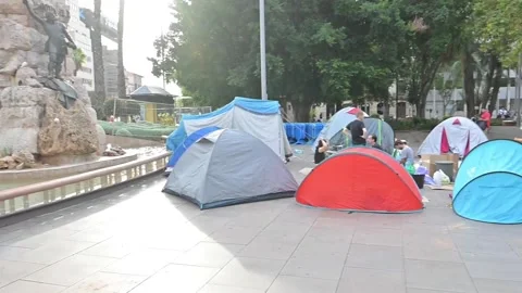 Palma joins Madrid housing protests with camp in city center, PALMA DE MALLORCA, Vídeo Stock 346708191