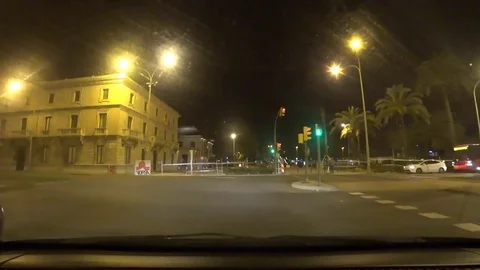Palma Mallorca Spain: Car leaving underground parking stucture onto main road in Stock Footage 81069470