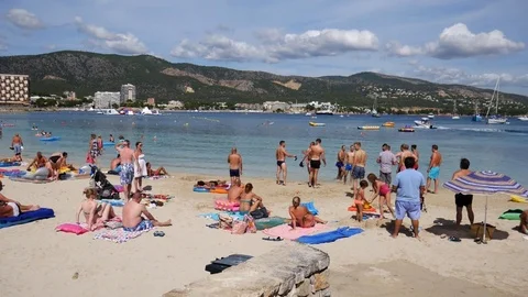 Palma Nova Mallorca Spain: Group of boys on the beach Video stock 81071795