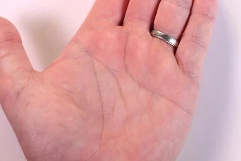 Palmistry or chiromancy image, close up of male hand Stock Photos