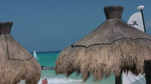 Palmleaf parasols on the beach Stock Footage 373236