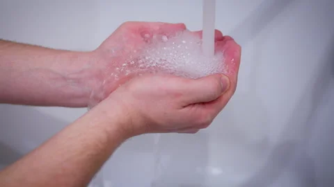 Palms under tap with clean and running water Stock Footage 314523714