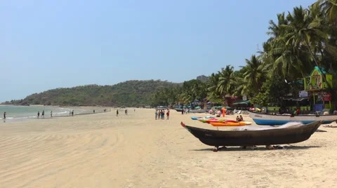 Palolem beach with small boat Stock Footage 43858299