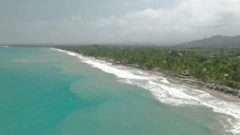 Palomino's Pristine Palm-Lined Beaches and Vast Ocean in Northern Colombia Stock Footage 283921378